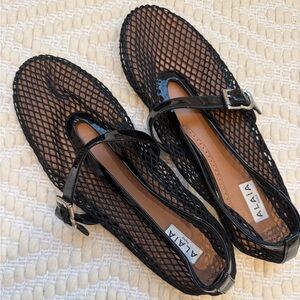 Alaia fishnet mesh flats